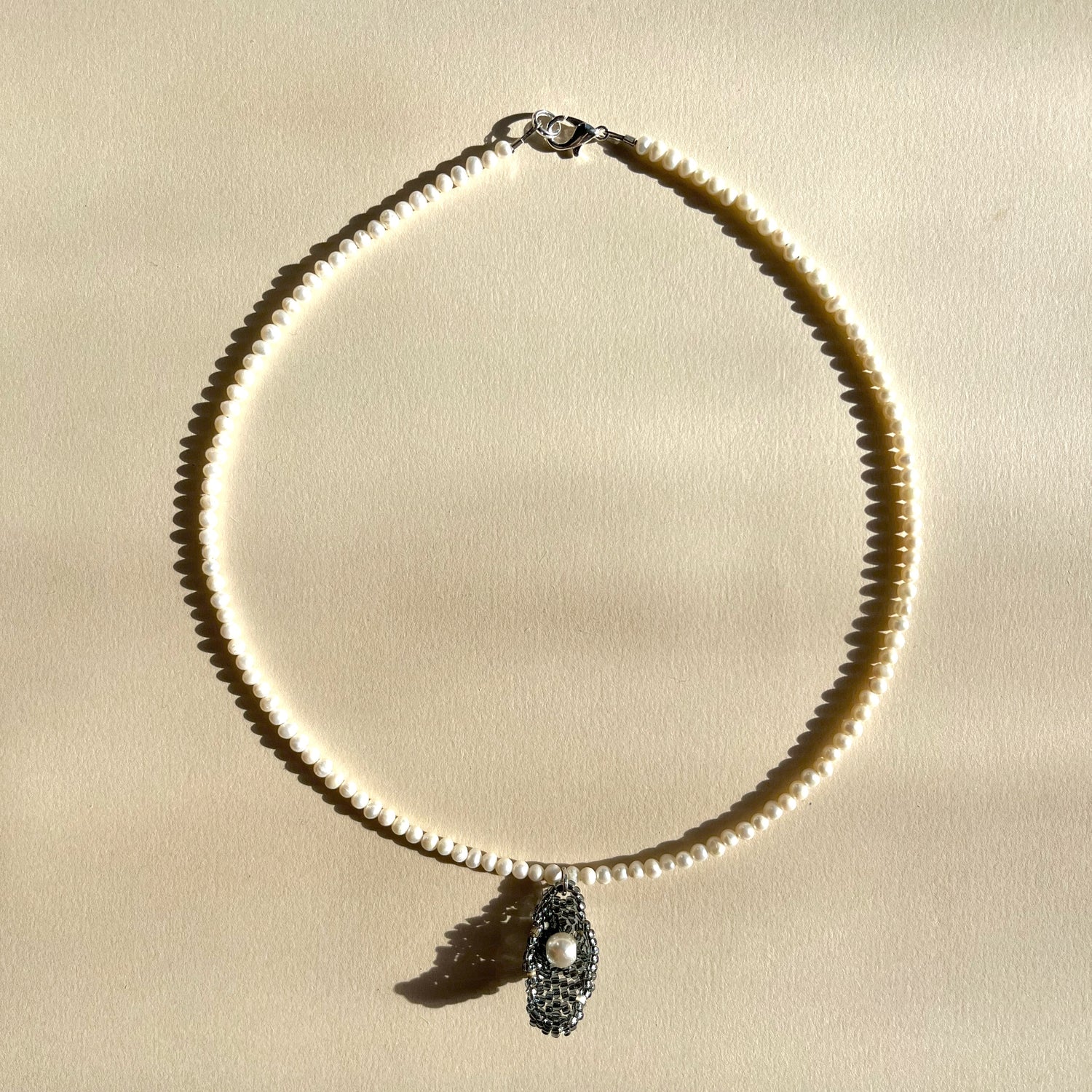 OYSTER GIRL NECKLACE